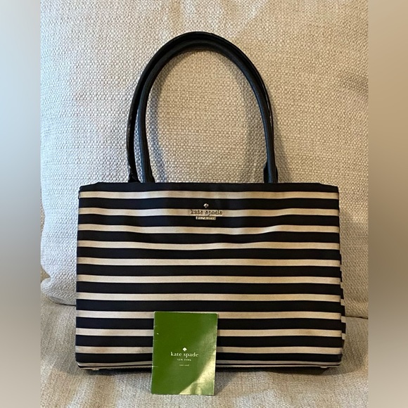 kate spade Handbags - Very GUC Kate Spade classic black & white  stripe purse